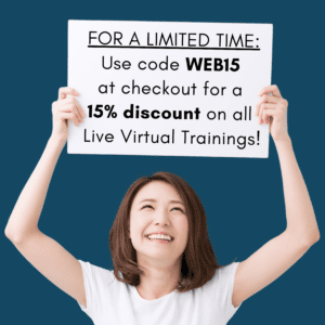 A woman holds a sign that says "15% discount on all live virtual training".