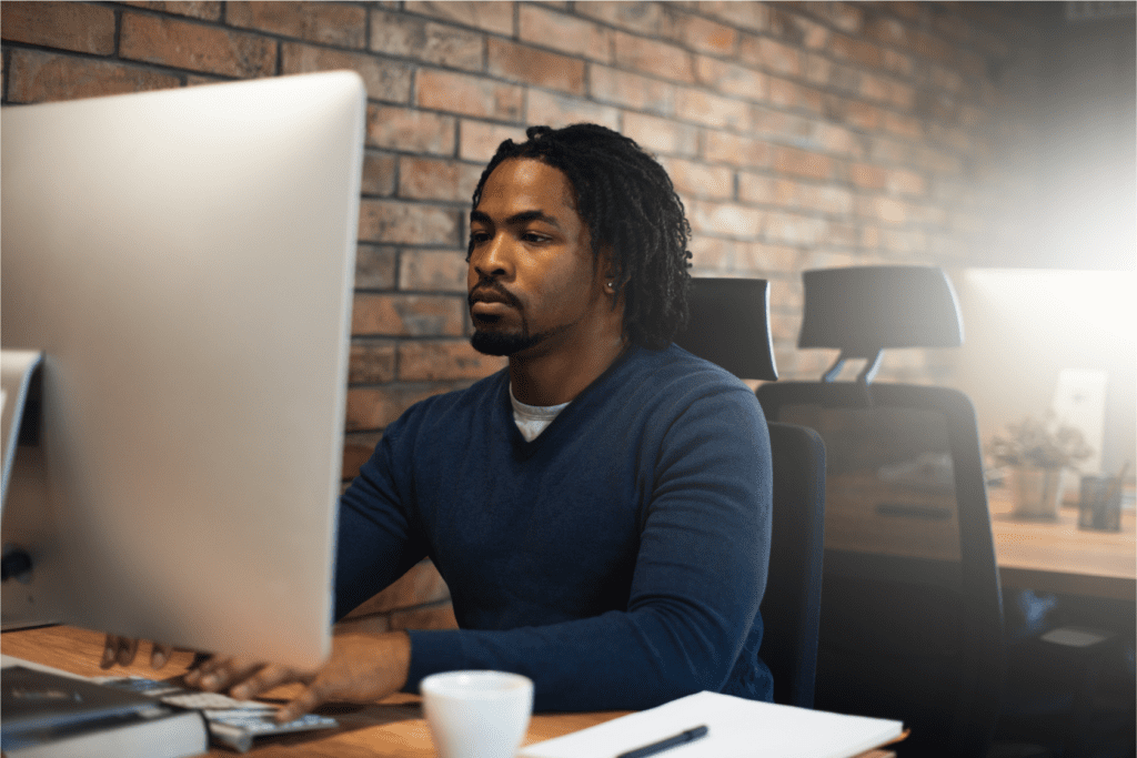 A man is working on his computer.